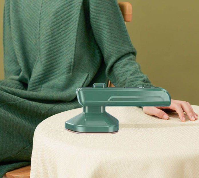 portable hand-held steam iron