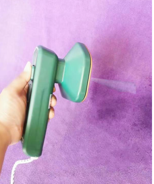 portable hand-held steam iron